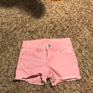 Pink shorts with stringy bottom